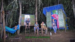 Camping in heavy rain, many people slept soundly in multistorey cabins