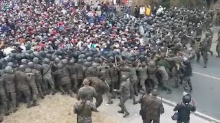 video: Watch: Migrant caravan clashes with Guatemalan police on way to Mexico and US