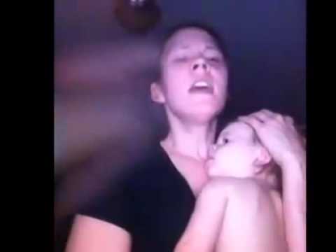 mom sings to baby