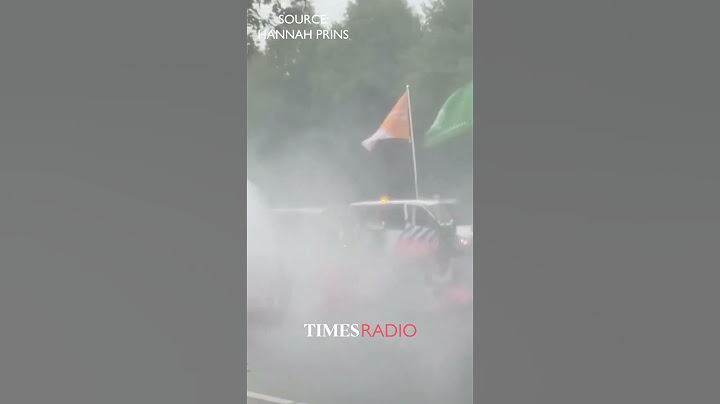 Extinction Rebellion protesters sprayed with water cannon by police