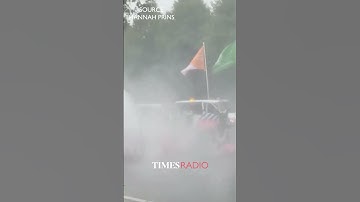 Extinction Rebellion protesters sprayed with water cannon by police