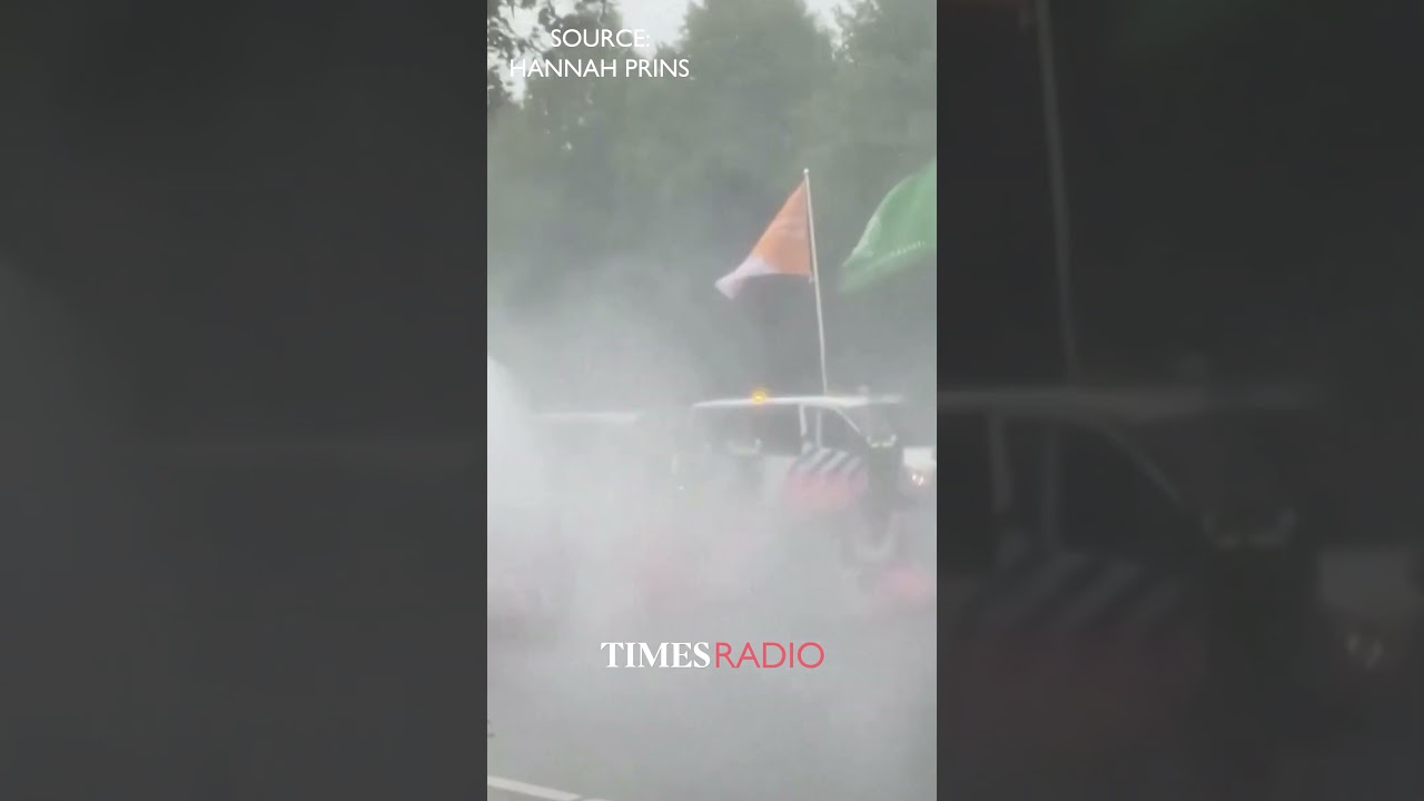 Extinction Rebellion protesters sprayed with water cannon by police