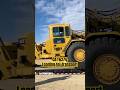 Loading a CAT 627G for transport. #heavyequipment #heavyhaul #caterpillarequipment #627g #trucking
