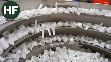 Vibratory Feeder: 70 PPM Custom Scoop Orientation System with Holdback/Release Escapement Feature