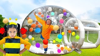 ellie alex and kaden build inflatable playhouse for children and learn about bees