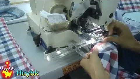 Thao tác đính cúc nhanh như máy.