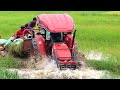 Tractor M6040SU was pusher tractor M6040SU transport rice of out mud  | Tractor drive across water
