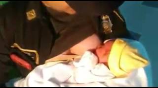 Police Officer Breastfeeding An Abandoned Newborn Baby Police Officer Breastfeeding An Abandoned Newborn Baby