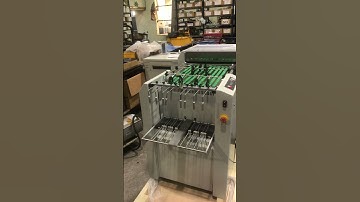 PTS Continuous forms cutter with descending stacker