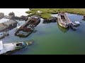 Boat graveyard Hoo marina.