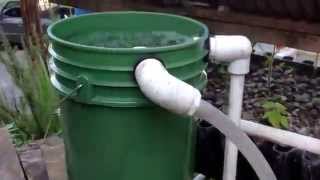 Bucket Vortex Aerator adjacent to water reservoir.