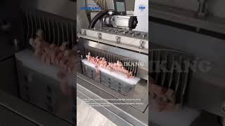 Efficiently dice frozen meat into uniform pieces with this high-performance dicing machine.