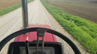 Tractor hauling scrap steel load (Case Ih)