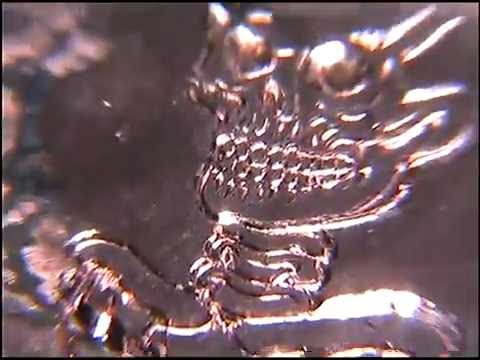 Carve a skull on a coin with a homemade hand engraving machine
