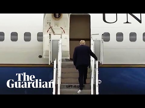 Donald Trump boards Air Force One with paper stuck to his shoe