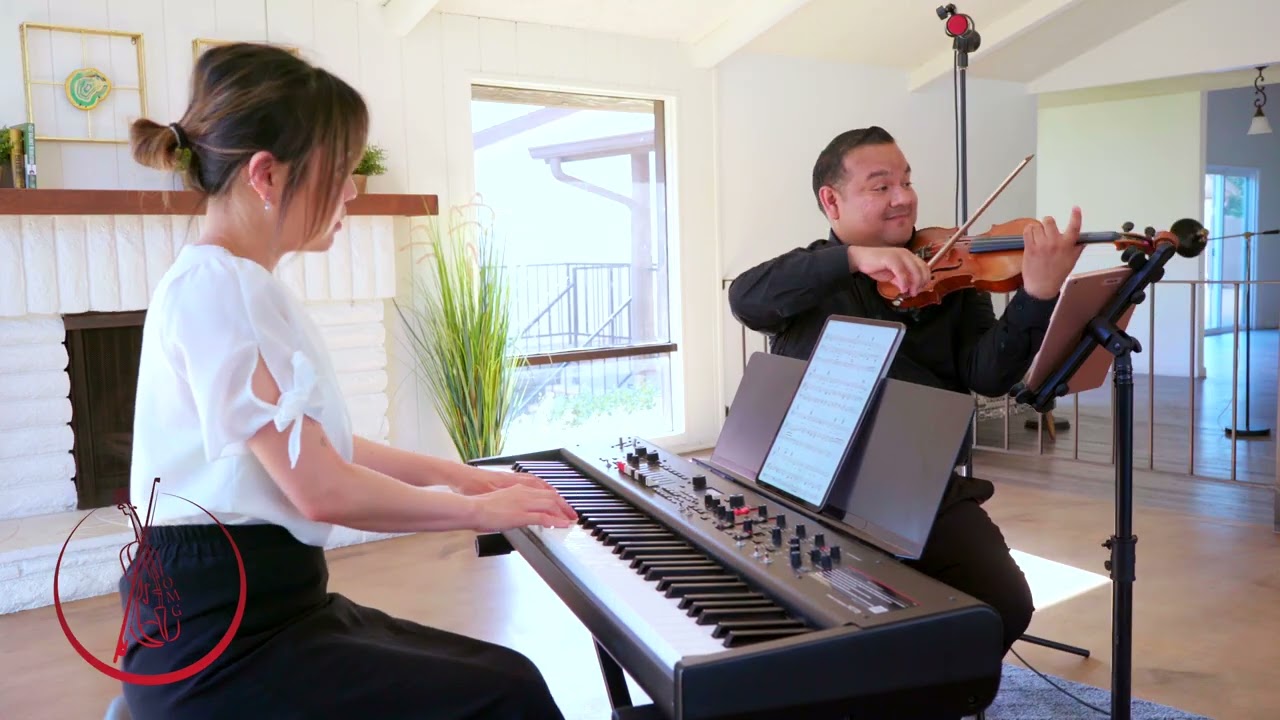 Bora and Hector performing A Dream Is a Wish Your Heart Makes