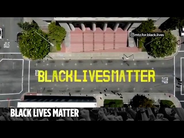 Man confronts suspects caught on camera defacing Black Lives Matter mural
