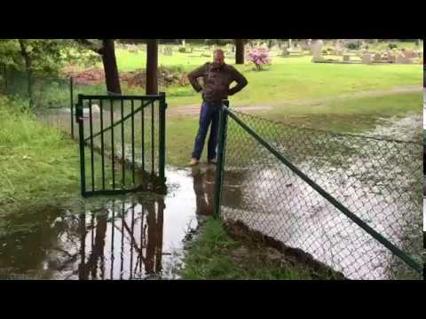 very-funny-video-man-tries-to-jump-over-deep-puddle-and-falls-face-first-into-puddle