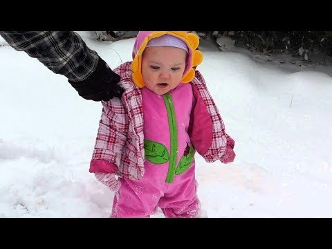 Funniest babies playing with snow in the first time