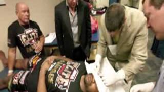 Rampage jackson Getting hes eye stitched up after UFC-136