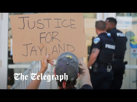 Protesters march in