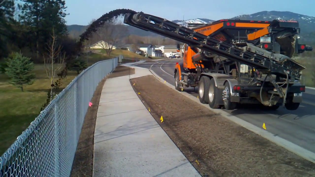 CAD Oklahoma, LLC Ultra Stone Slinger with ground drive Topsoil