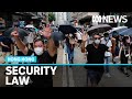 UK offers Hong Kong residents safe haven after China introduces new security law | ABC News