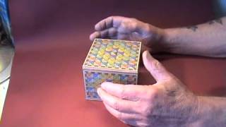 jenny A normal looking puzzle box. But nothing will push, pull or turn. So how does it open?