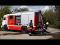 Пожарный КАМАЗ с насосом Rosenbauer забирает воду и подает воду