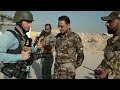 EXCLUSIVE - With the journalists on the frontline in Iraq