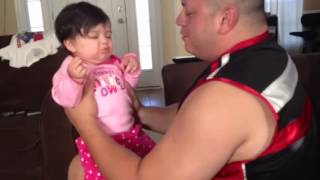 Baby doesn't like daddy's kisses