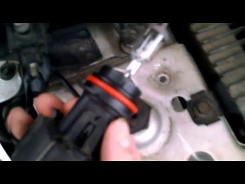 How to Replace the Headlamp in a 2003 Dodge Grand Caravan