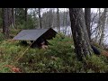 24 HOURS - Bushcraft poncho shelter overnighter - winter camping by a lake - cold and wet weather