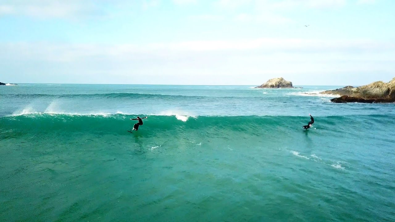 foil surfing in 18 second wave period swell made for some exciting