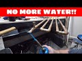 Removing water from an air system - air system water trap
