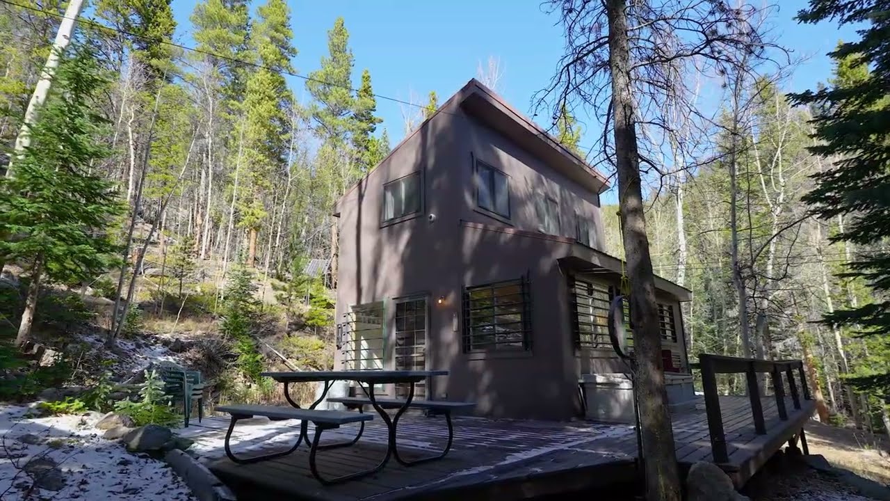 Idaho Springs Mountain Cabin | 11 Wooded Acres | Off-Grid Retreat with Solar Power & Stream $225,000