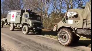 Unimog 404 ambulance used as towing point