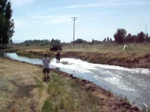 Shawn wakeboards the canal at Brian's