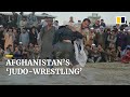 Afghan fighters throw down in ‘judo-wrestling’ matches in dusty Kabul field