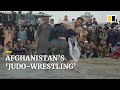 Afghan fighters throw down in ‘judo-wrestling’ matches in dusty Kabul field