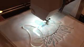 Use a coloring book to trace a design, then stitch on fabric