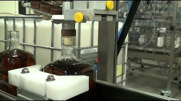 Semi Automatic Corker on Automated Conveying System