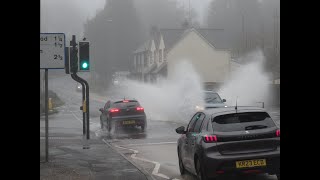 Splashing cars in Gurney . after heavy rain .2024