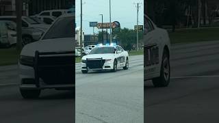 Two police unit running a high-speed Highway 49 Gulfport Mississippi￼