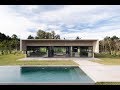 Spectacular Concrete House Surrounded by Fields and Vegetation