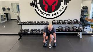 Staggered Stance Dual Kettlebell Deadlift