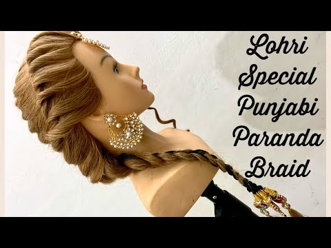A Paranda in action. This is the best pic I could find, despite the fact  that most of it is under her arm. You … | Indian hairstyles, Hairstyle,  Mehndi hairstyles