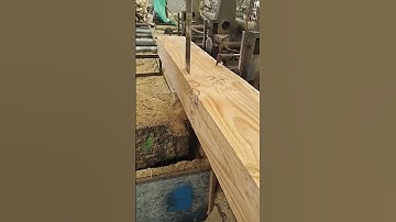 Wood is processed at a wooden architectural factory