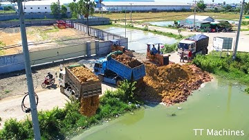 First Job Filling Land Into Deep Water By Dump Trucks Unloading & Dozer Push Stone  Soil