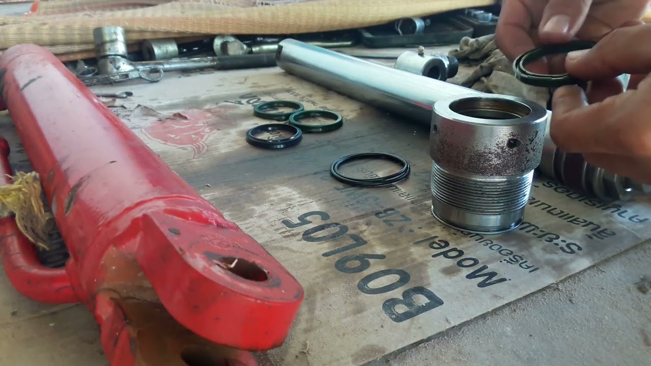 เปลี่ยนซีลไฮดรอลิค,ผานดันดินหน้า,กระบอกไฮดรอลิครถไถ,กระบอกรถไถยันม่า,รถไถ ยัน ร์ มา 49